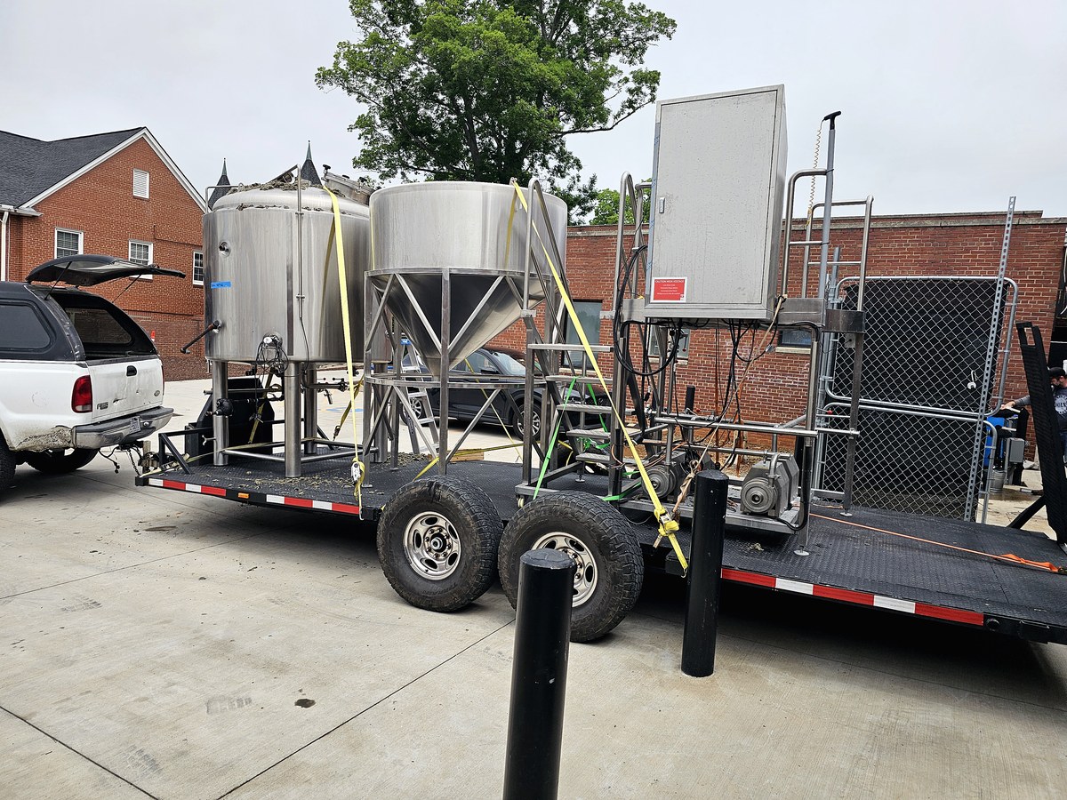 Brewhouse vessels and a control panel loaded on a trailer